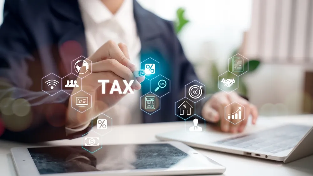 VAT and corporate tax concept image illustrating TRN Verification Support in Sharjah, Ajman, and Ras Al