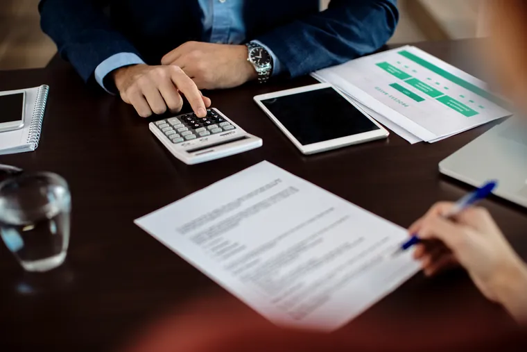 VAT and corporate tax concept image illustrating What Businesses Should Know Before Filing an FTA