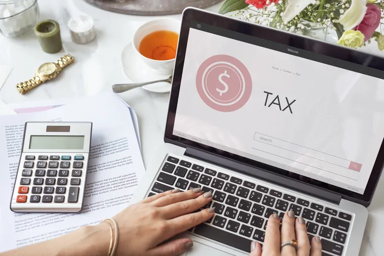VAT and corporate tax concept image illustrating Why Smart UAE Businesses Are Taking TRN Compliance Seriously