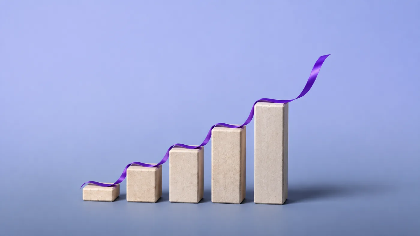 Rising blocks with a violet ribbon sweeping over them, representing cost-effective and faster growth with Vigor